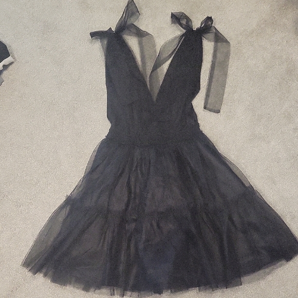 Dresses & Skirts - Elegant Black Dress with Sheer Details